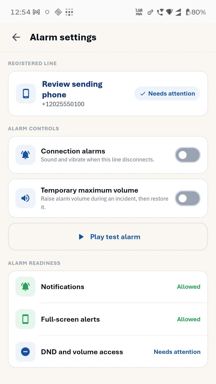 Actual Alarm settings screen showing connection alarms, optional temporary maximum volume, and readiness controls